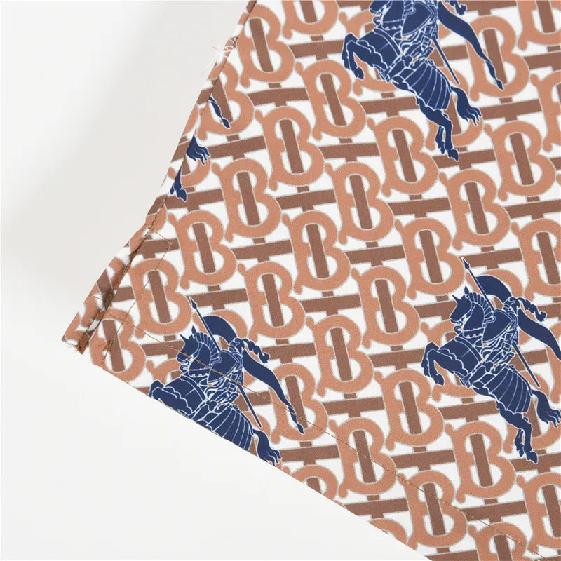 BUR All-Over Monogram Knight Print Shorts in Brown – 371 – bbr0000371
